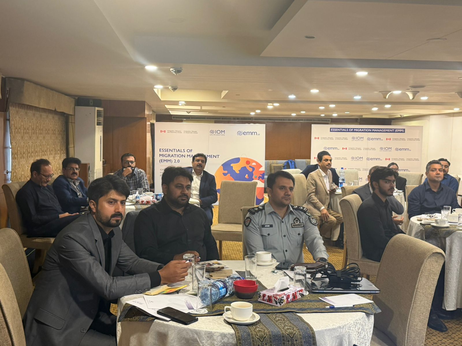 Participants taking notes during the training